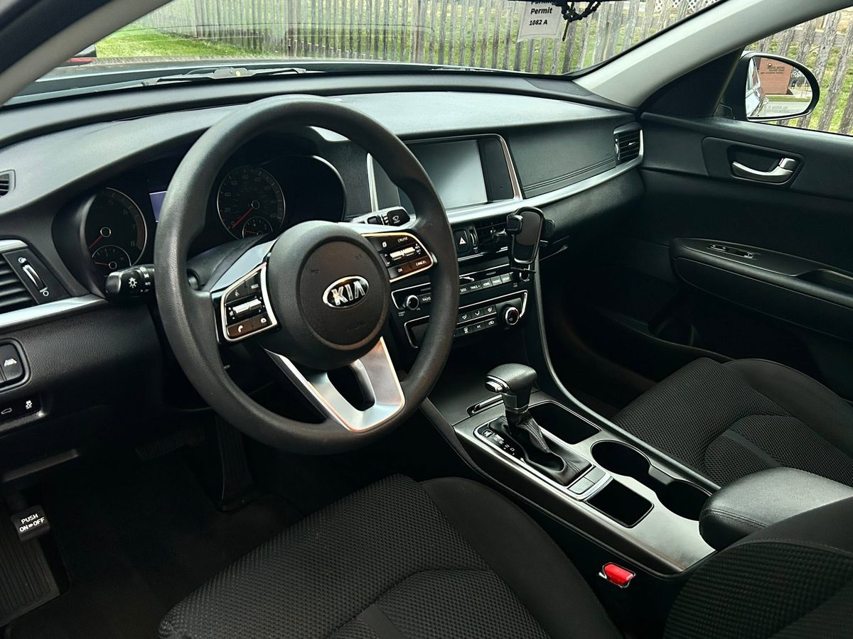Finished interior of a Kia Optima detailed by LTM